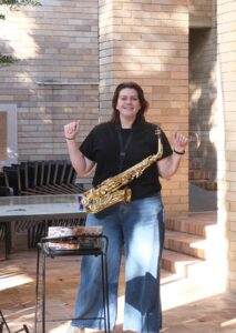 saxophone and piano teacher Louisa