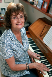 Older lady playing piano